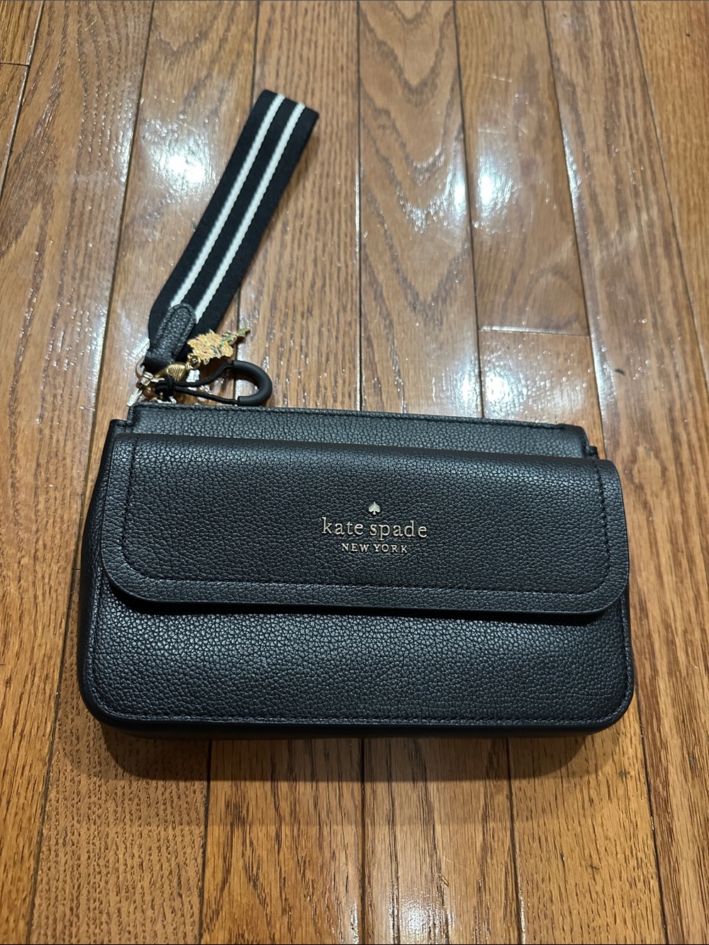 kate spade Black Pebbled Leather Wristlet with Striped Strap